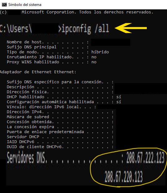 Símbolo del sistema de una PC mostrando el comando “ipconfig /all”, y la dirección del servidor primario y secundario de OpenDNS en el apartado “Servidores DNS”.