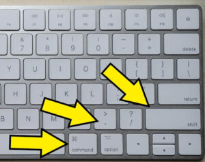 Клавиатура Mac с клавишами «Command», «Shift» и точкой.