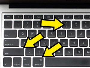 Mac mostrando las teclas “Command”, “Shift”, y “6”.