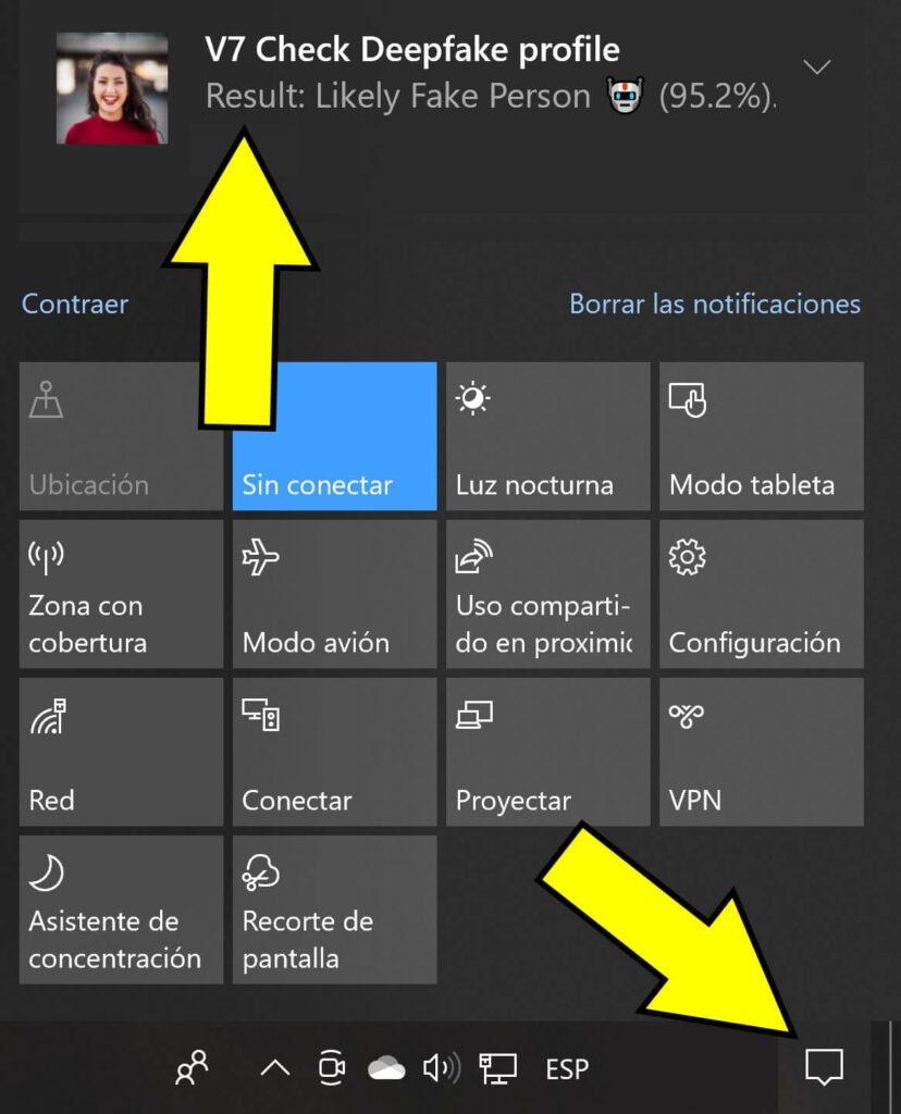 Icono de notificaciones de un PC, y la notificación indicando que la persona en una foto es falsa.