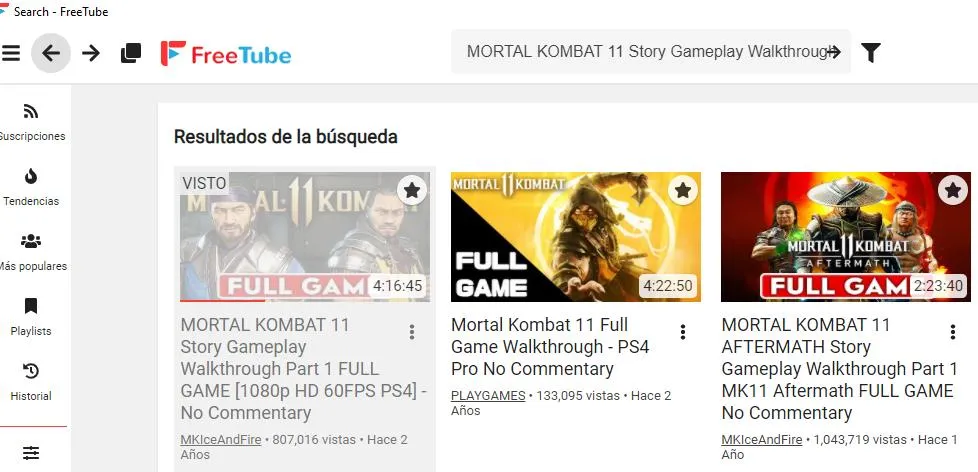 FreeTube mostrando las palabras clave “Mortal Kombat 11” y un icono en forma de flecha en su barra de búsqueda.