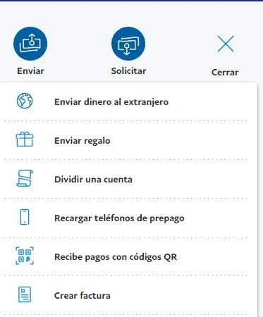 Página de inicio de PayPal mostrando el menú desplegable que aparece al clicar en el botón “Más”. Aquí se puede observar la opción “Crear factura”.